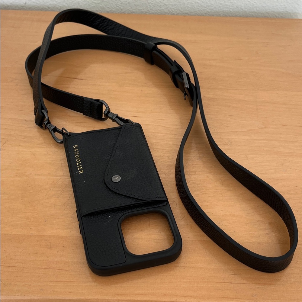 Bandolier Hailey black leather crossbody phone holder. Fits iPhone 14 Pro.